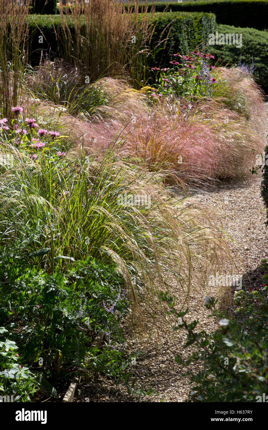 Gravel path and summer boarder in English garden Stock Photo
