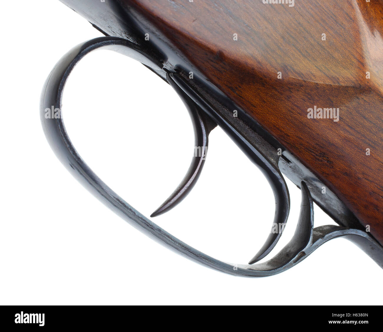 Double triggers that are on an old shotgun isolated on white Stock