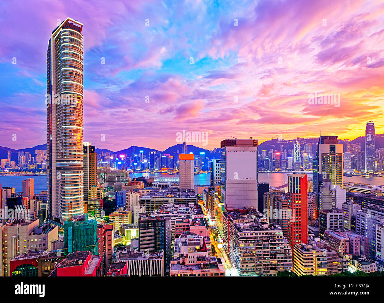 Hong Kong skyline at sunset Stock Photo - Alamy
