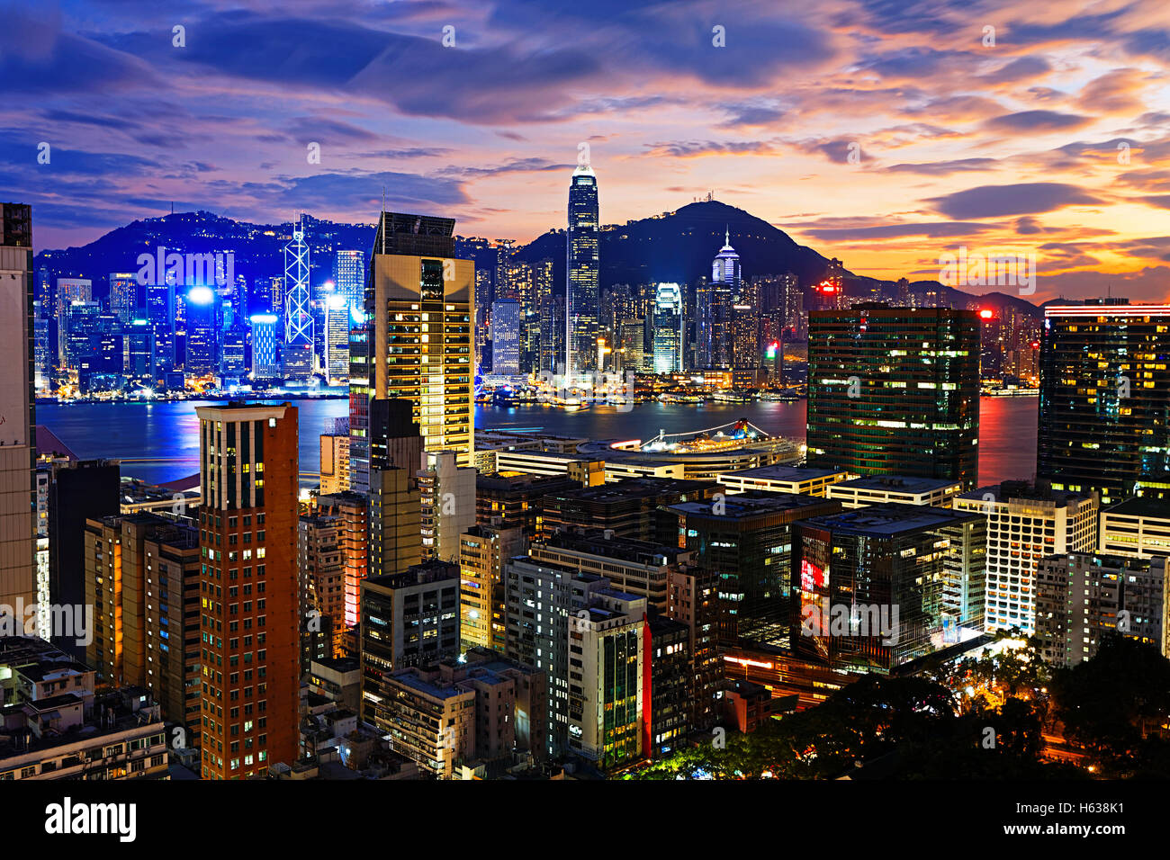 Hong Kong skyline at sunset Stock Photo - Alamy