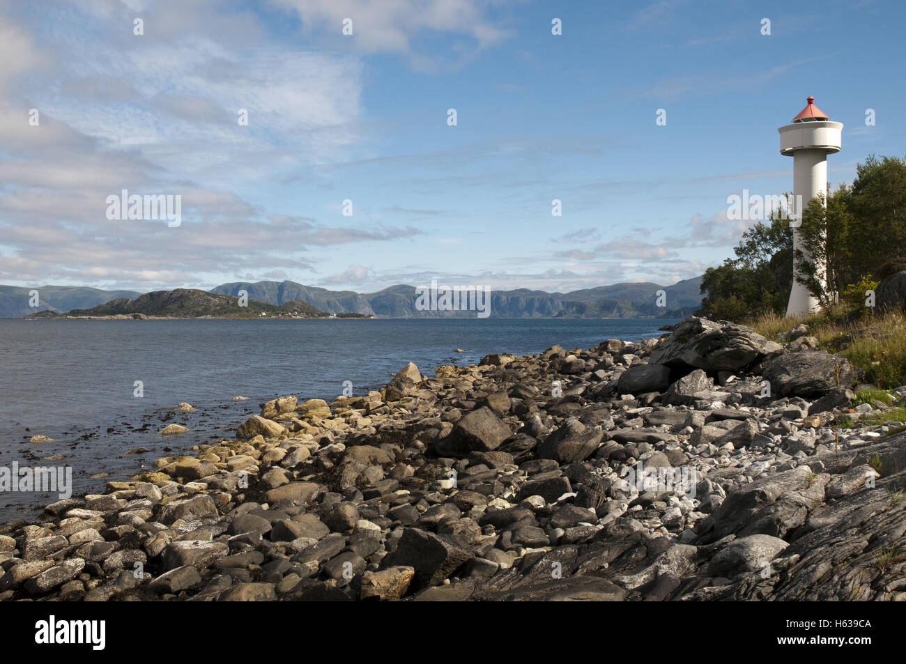 View over Ulvesund lighthouse and strait near Måløy, western Norway. Stock Photo