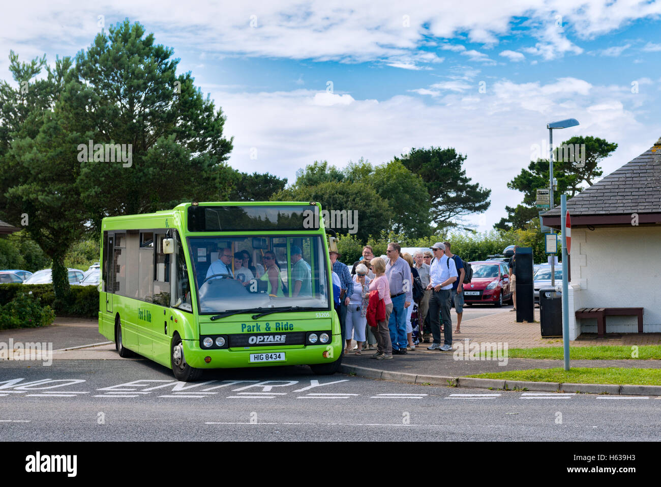 Passengers board a smart Park and Ride bus bound for Dartmouth town in Devon, UK Stock Photo