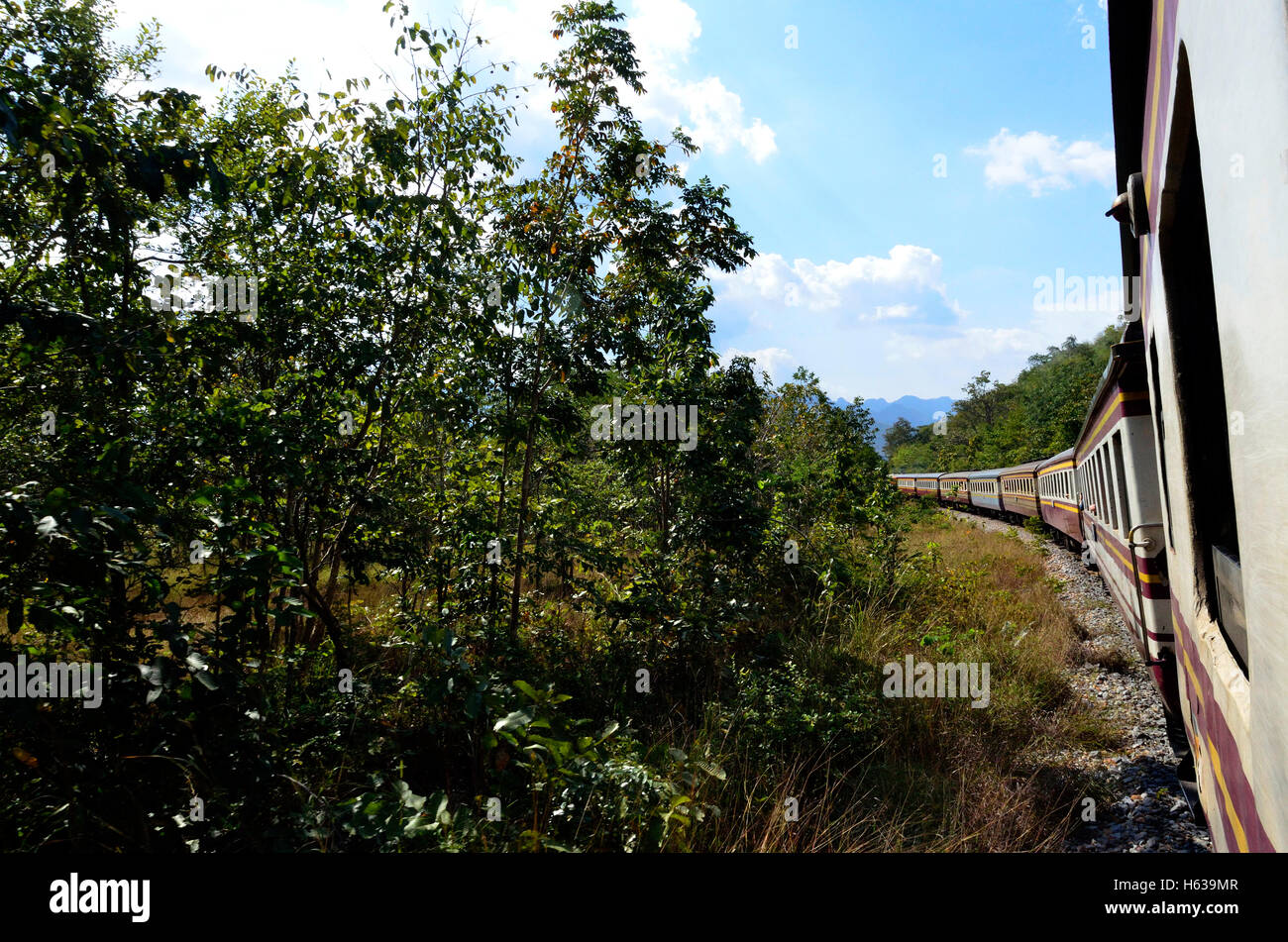 View from the Train between Bangkok to Nam Tok over the River Kwai Bridge Stock Photo