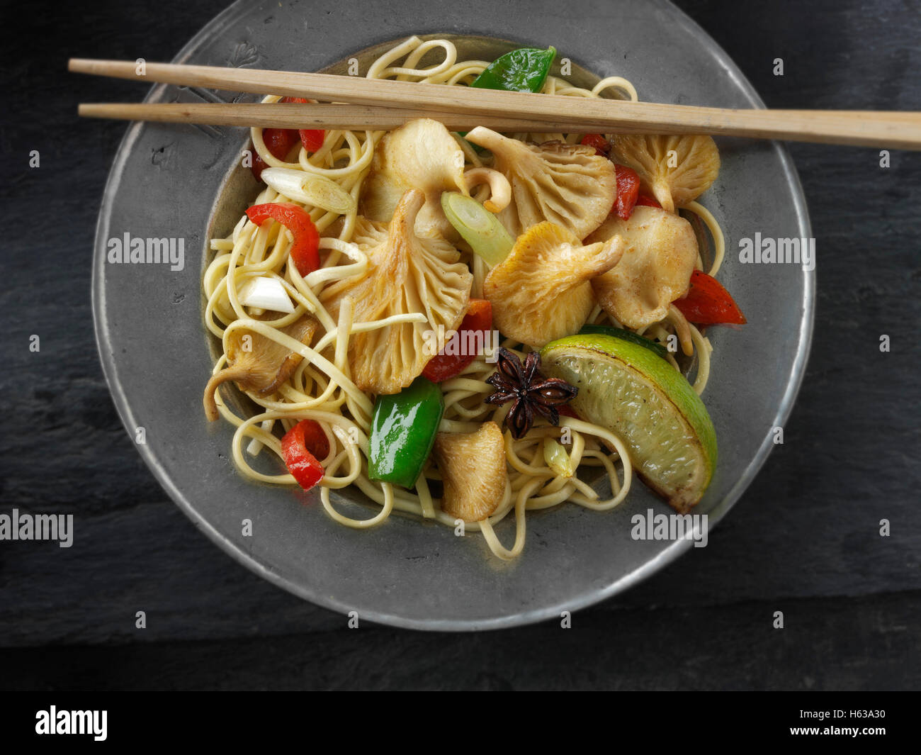 Yellow Oyster mushroom stir fry with noodles, mange tout, red pepper
