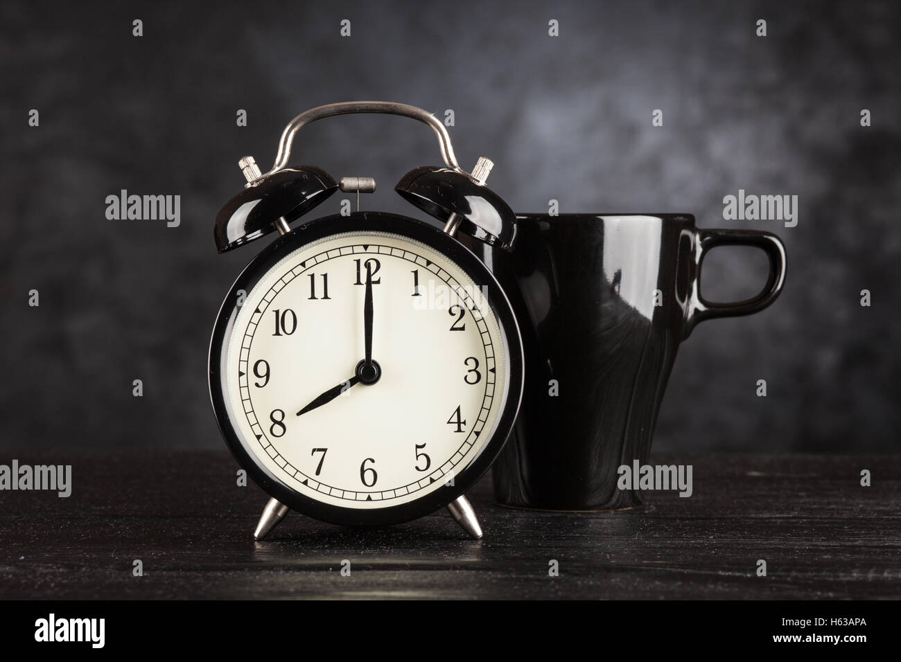 Alarm clock and a cup of coffee Stock Photo Alamy