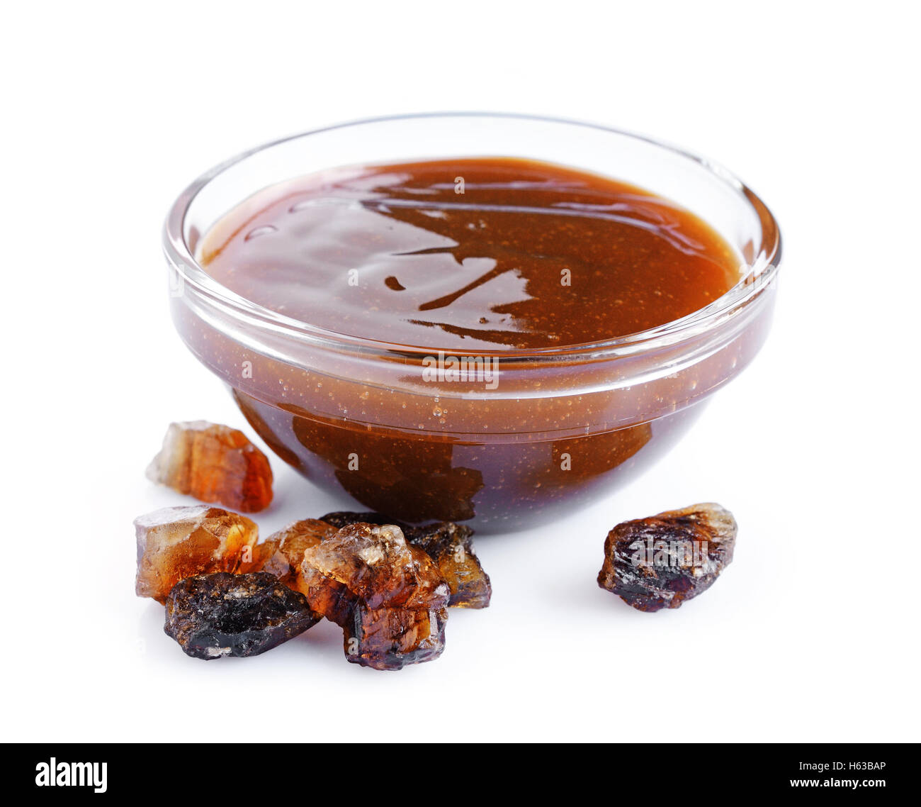 Liquid caramel and caramelized sugar isolated on white background Stock Photo