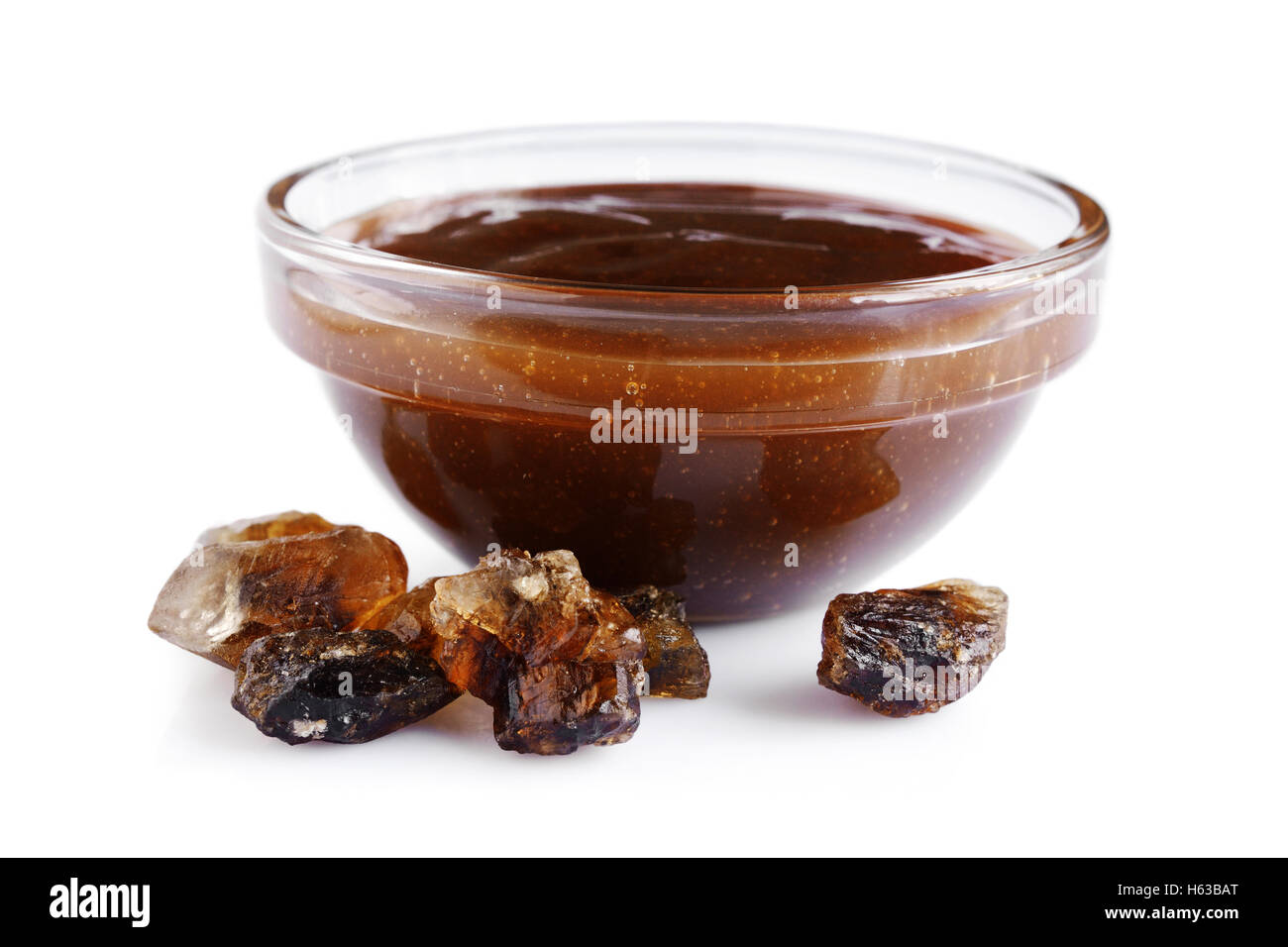 Liquid caramel and caramelized sugar isolated on white background Stock