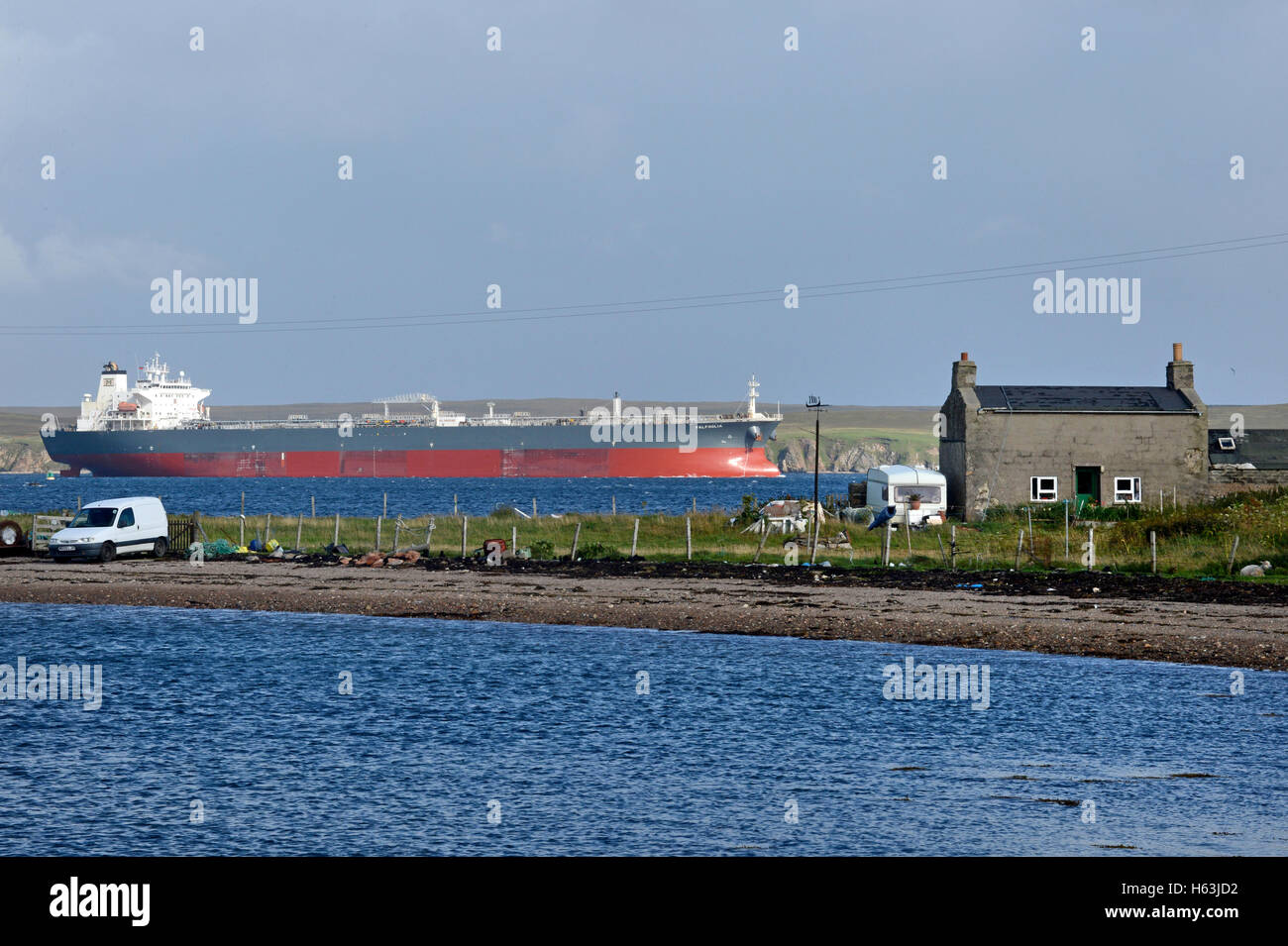 Oil Tanker entering the port of Sullom Voe to load Brent or Clair Crude oil from the north sea oil fields Stock Photo