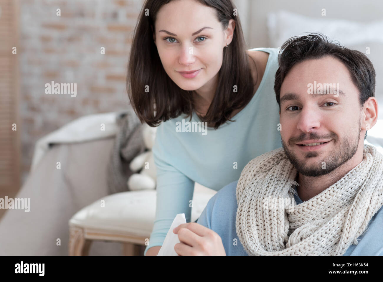 Happy optimistic couple looking at you Stock Photo