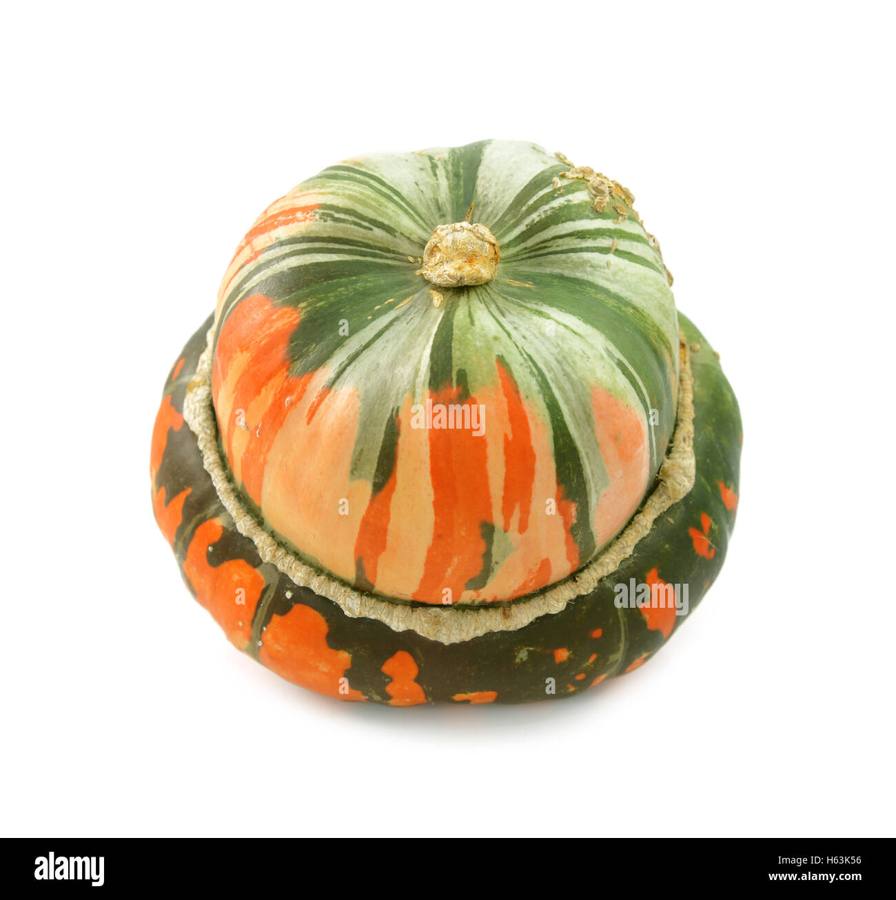 Unusual orange and green striped turban squash, isolated on a white background Stock Photo