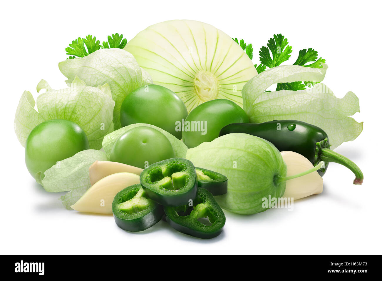 Tomatillos, jalapenos, garlic and onion with coriander. Ingredients for Mexican salsa verde