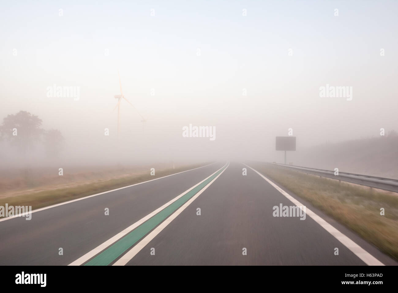 way to work depends fog on the motorway Stock Photo