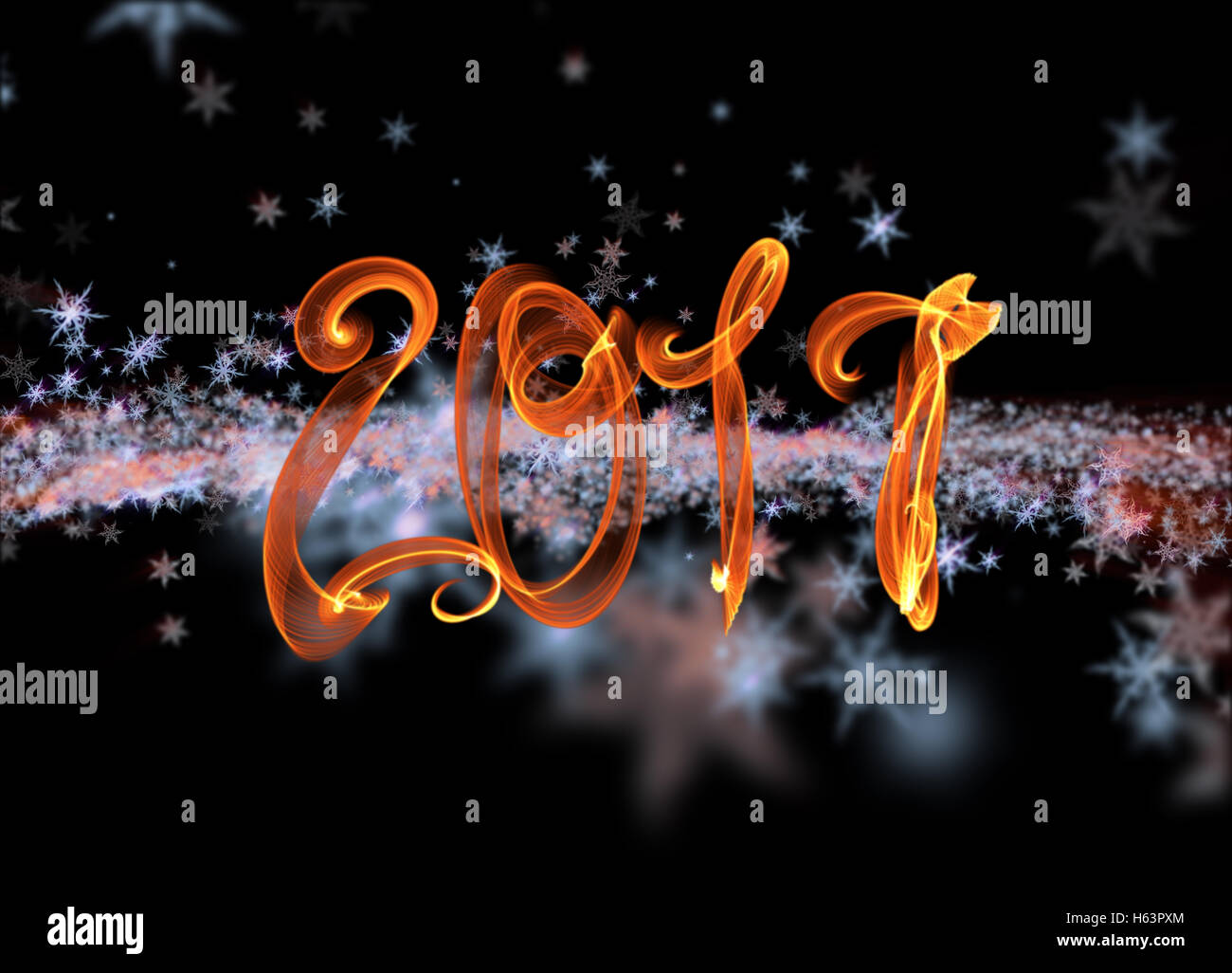 Snowflakes winter field cloud background and 2017 fire flame lettering. Happy new year, Christmas theme blurred bokeh. Stock Photo