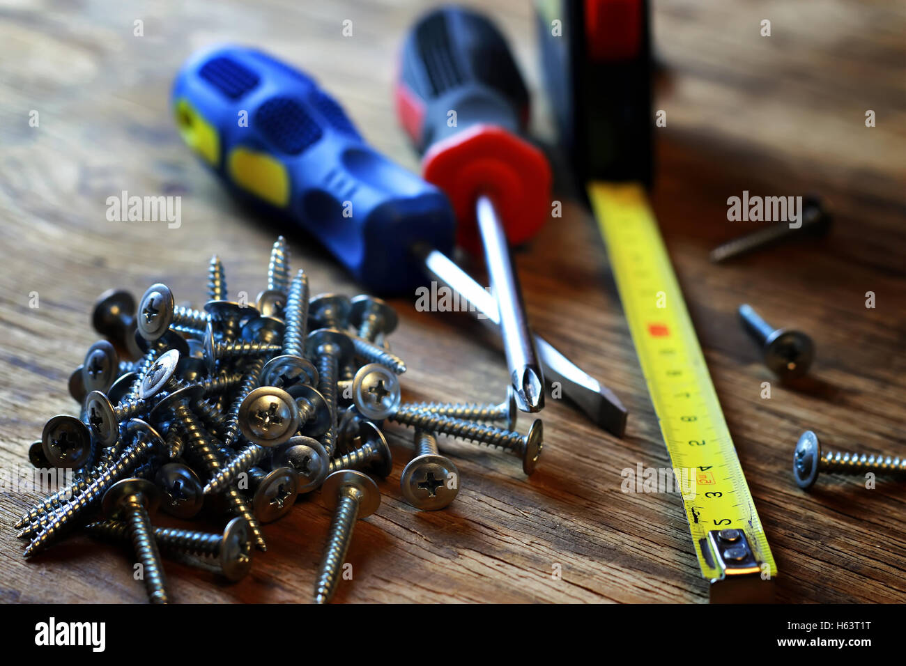 screws and screwdriver stack Stock Photo - Alamy