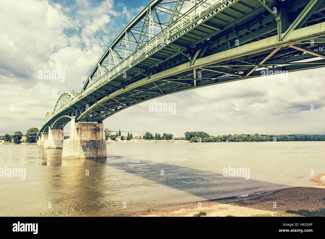 Maria Valeria bridge joins Esztergom in Hungary and Sturovo in Slovak republic across the Danube river. Retro photo filter. Stock Photo