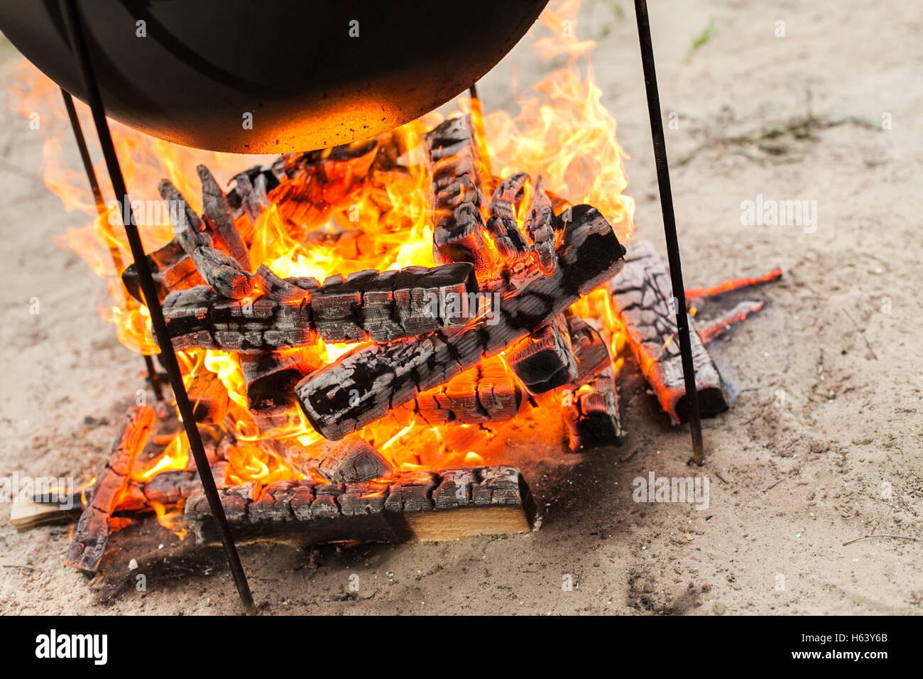 Cooking on a fire. Stock Photo