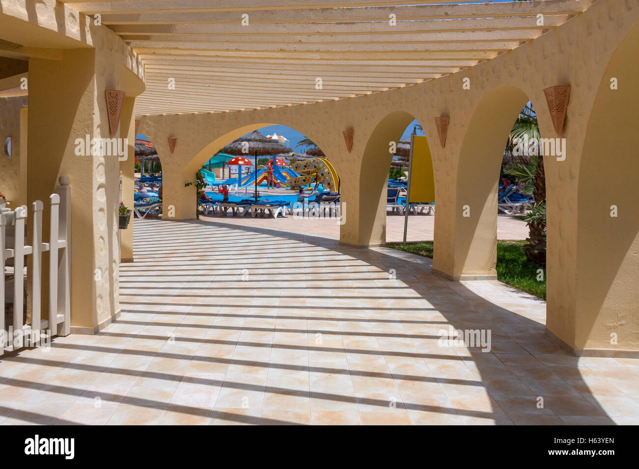 open roof veranda with arches and shadows Stock Photo