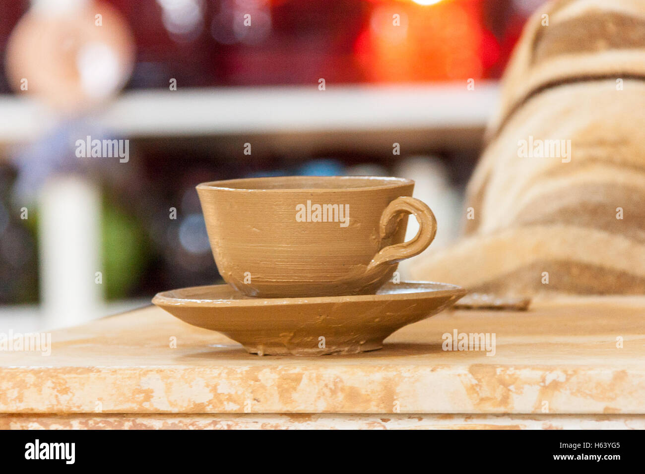 hand made clay cup and saucer Stock Photo Alamy