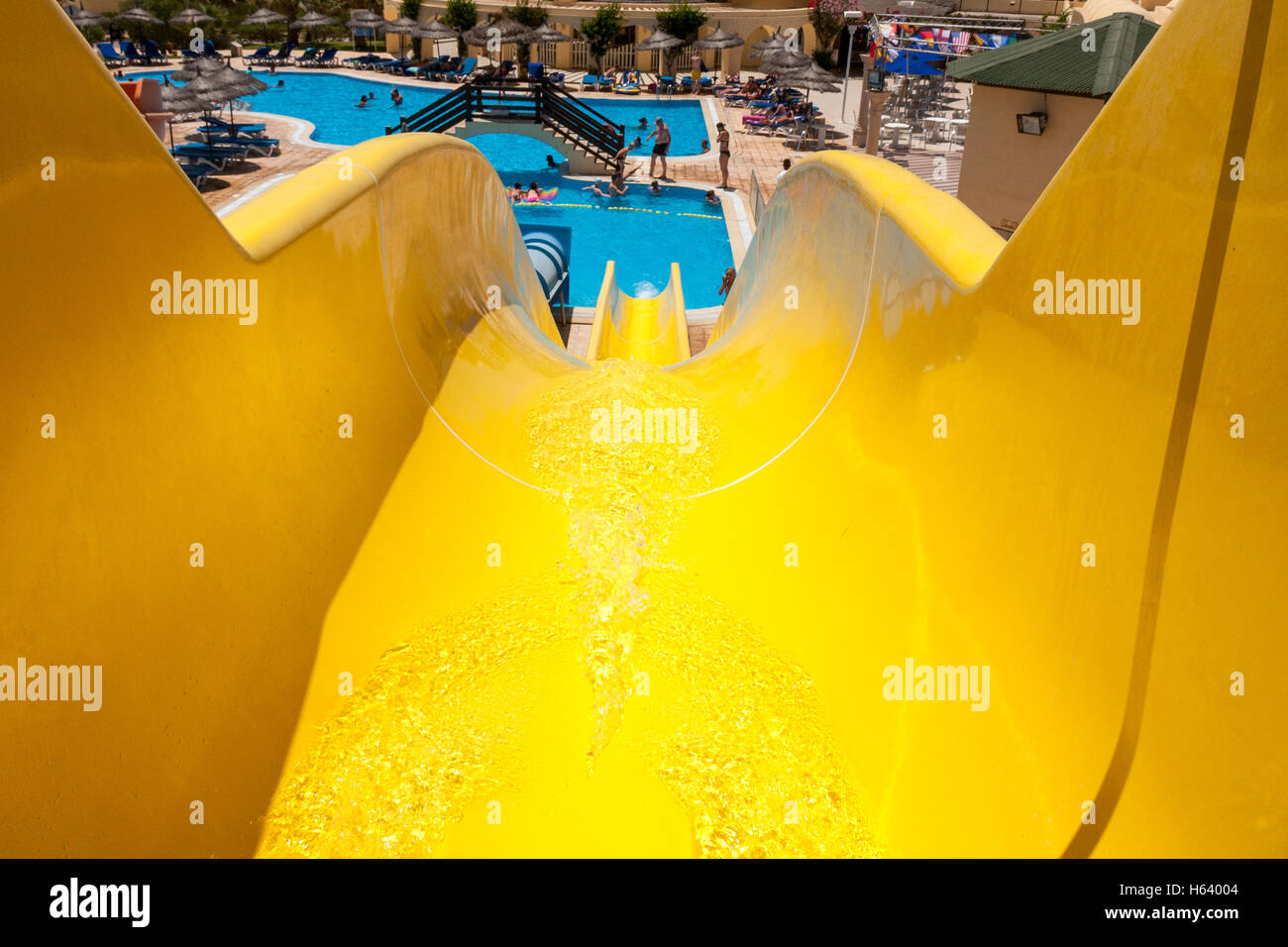 Yellow water slide hires stock photography and images Alamy