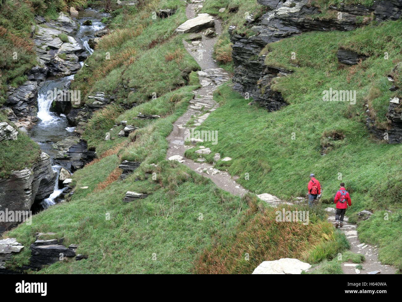 Walkers at Rocky Valley, St Nectan's Glen, Cornwall, England, UK Stock Photo