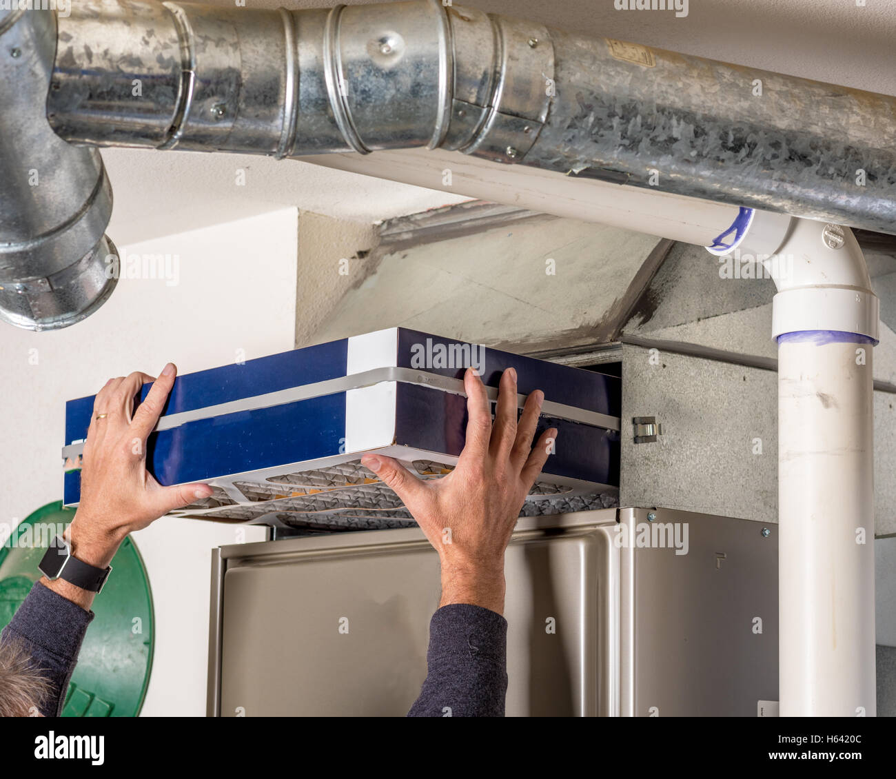 Home furnace air filter replacement Stock Photo Alamy
