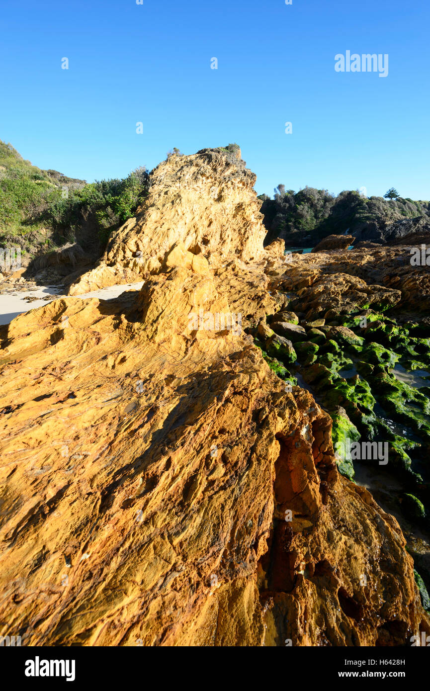 View of Pillow lava. This rock shape is most often the result of undersea volcano eruptions.Narooma Surf Beach, New South Wales, NSW, Australia Stock Photo