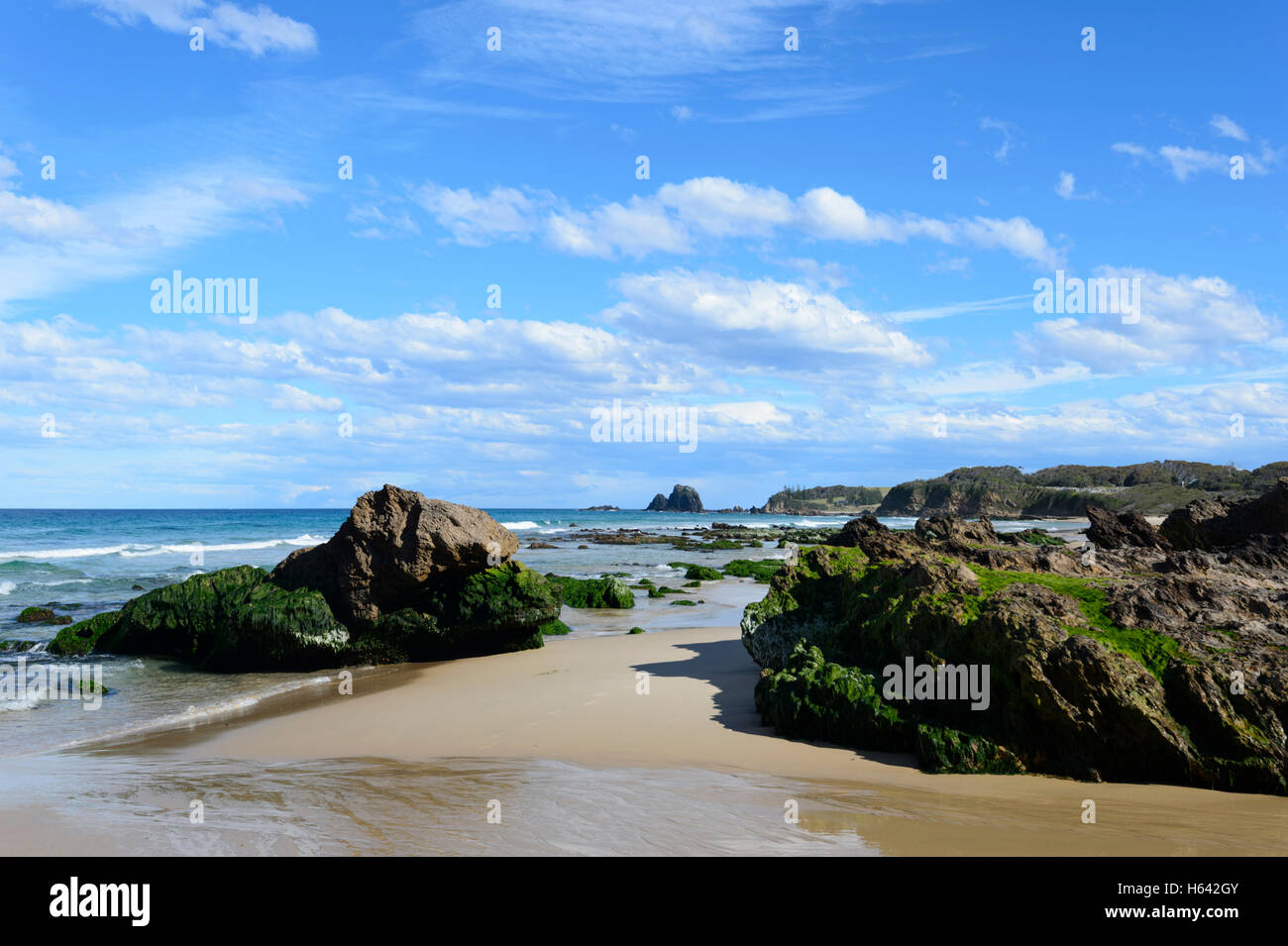 Surf Beach with Glasshouse Rocks in the distance, Narooma, South Coast, New South Wales, NSW, Australia Stock Photo