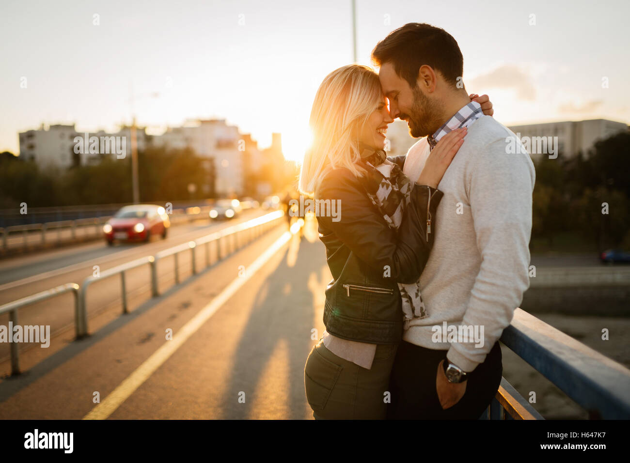 Couple kissing on love bridge hi-res stock photography and images - Alamy