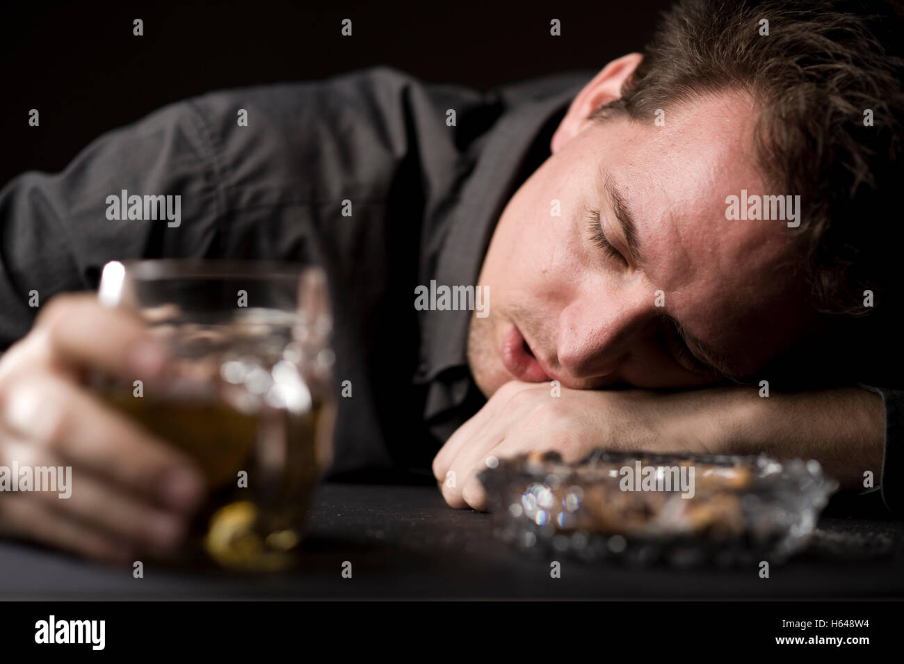 Drunk man with beer Stock Photo