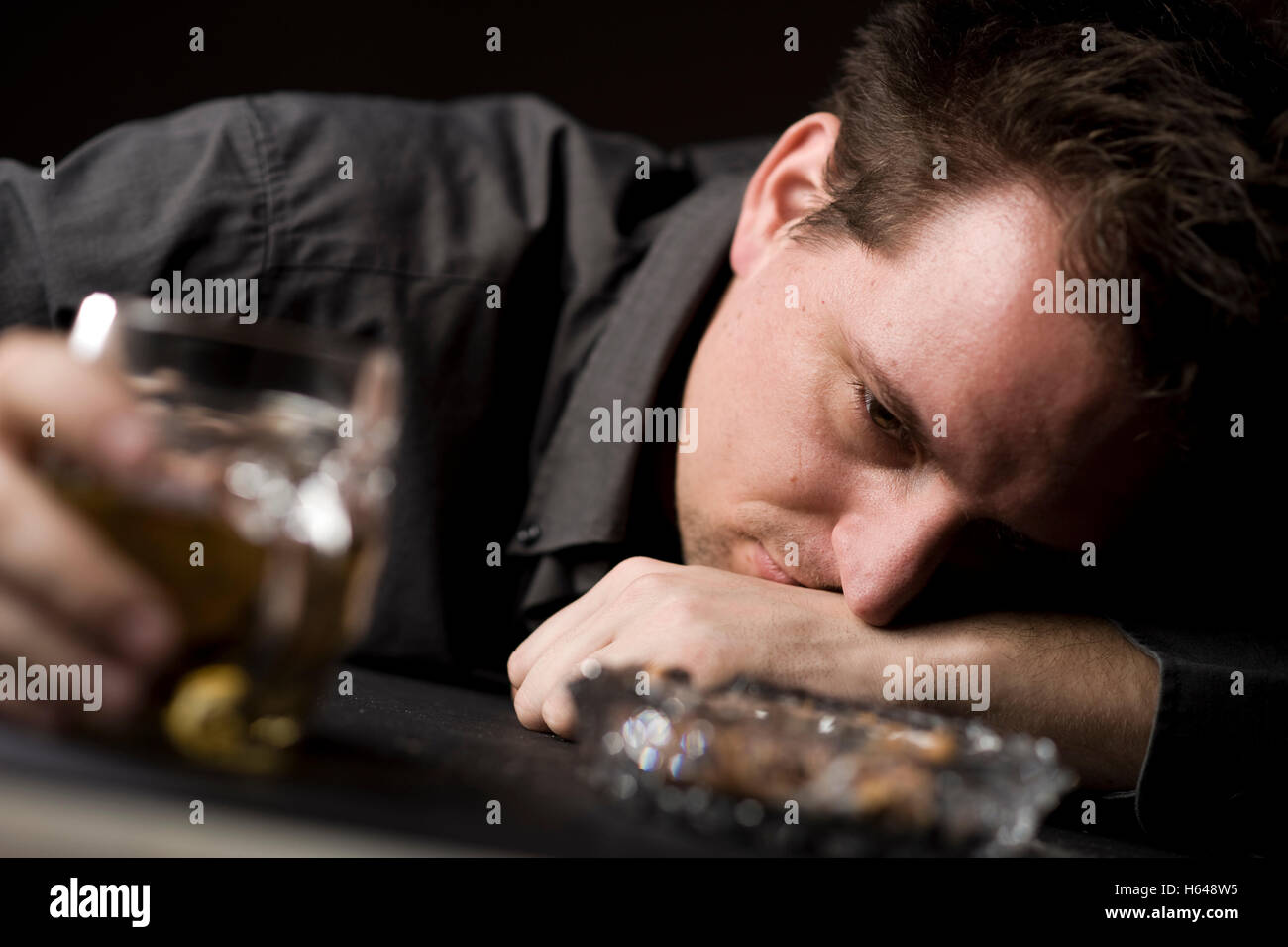 Drunk man with beer Stock Photo