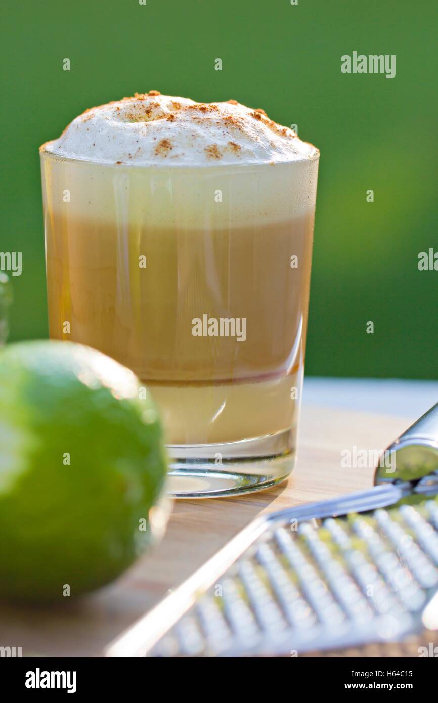 Layered coffee, condensed milk, liqueur, espresso and milk froth Stock