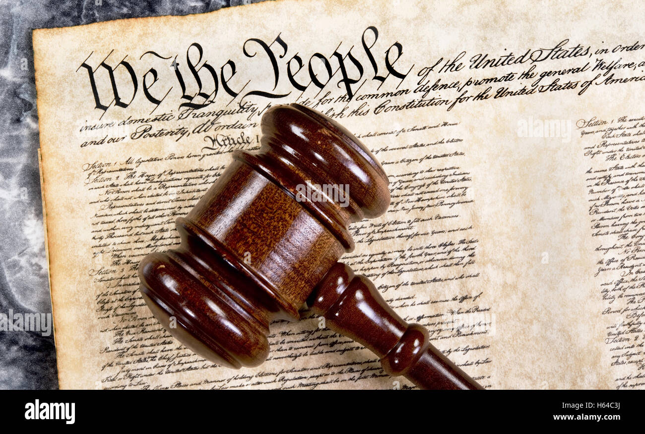 People Using Gavel we the people with wooden gavel Stock Photo - Alamy