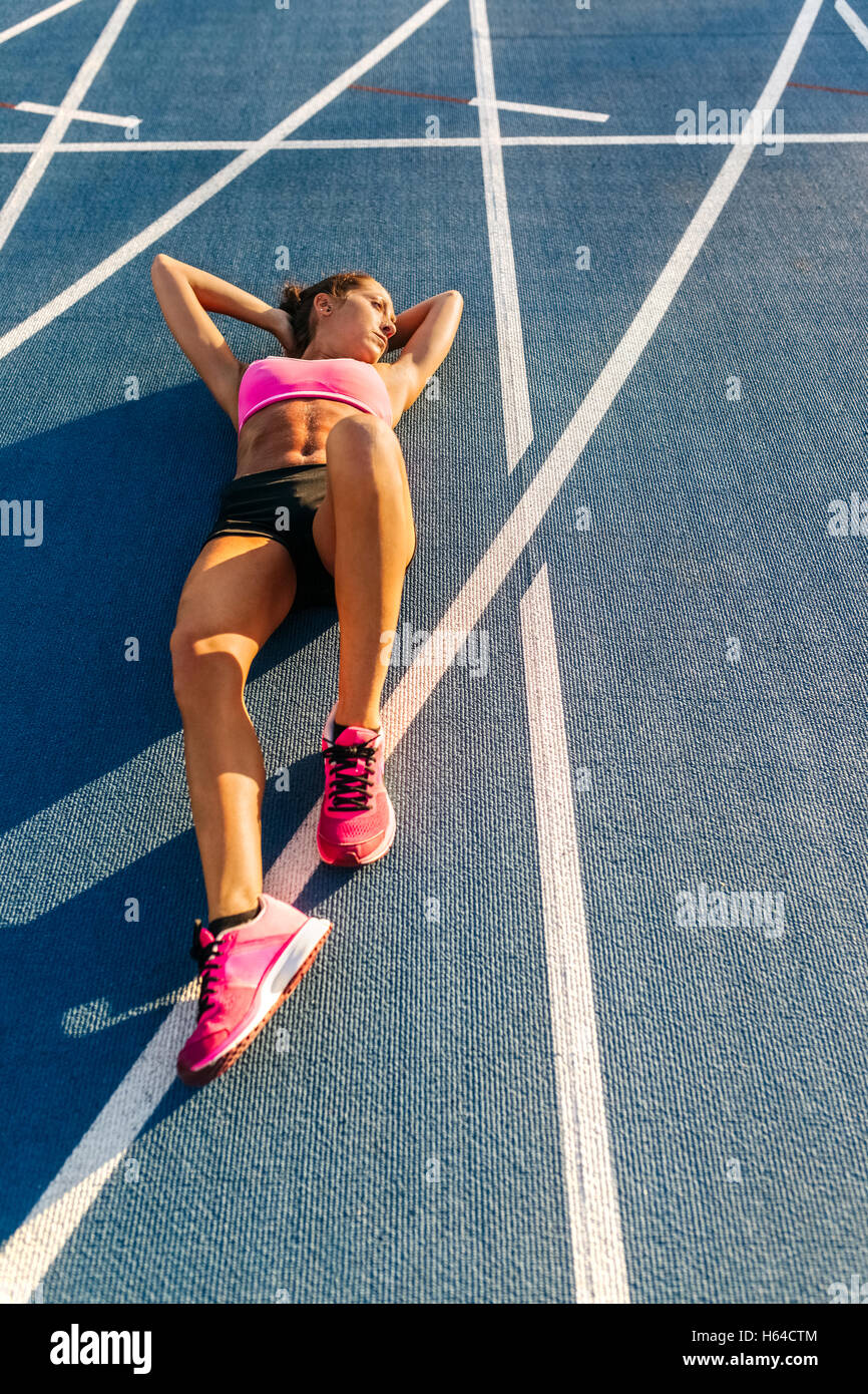 Athlete woman recovering after training hi-res stock photography and ...