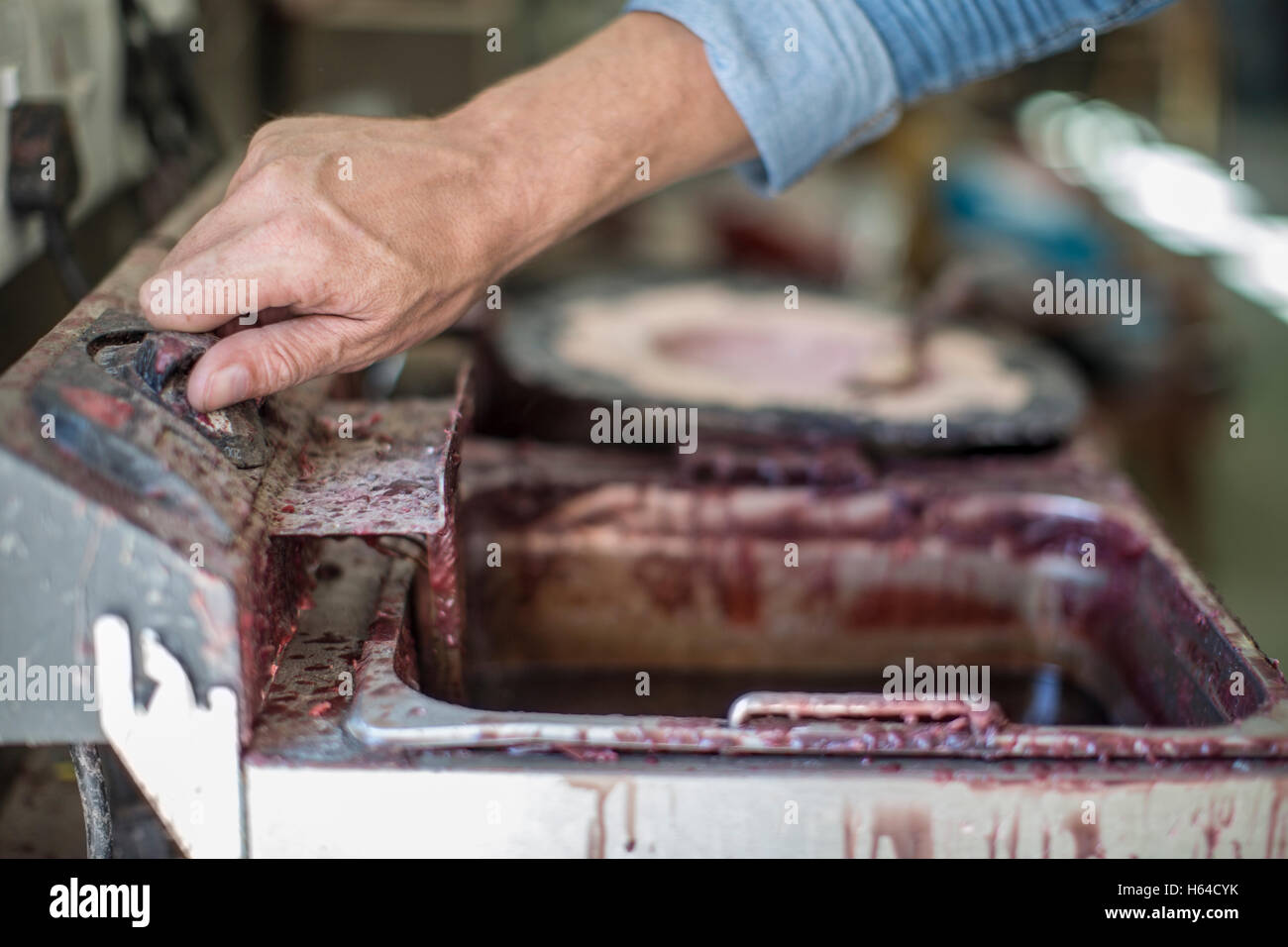 Artist mixing sculpting mould wax Stock Photo Alamy