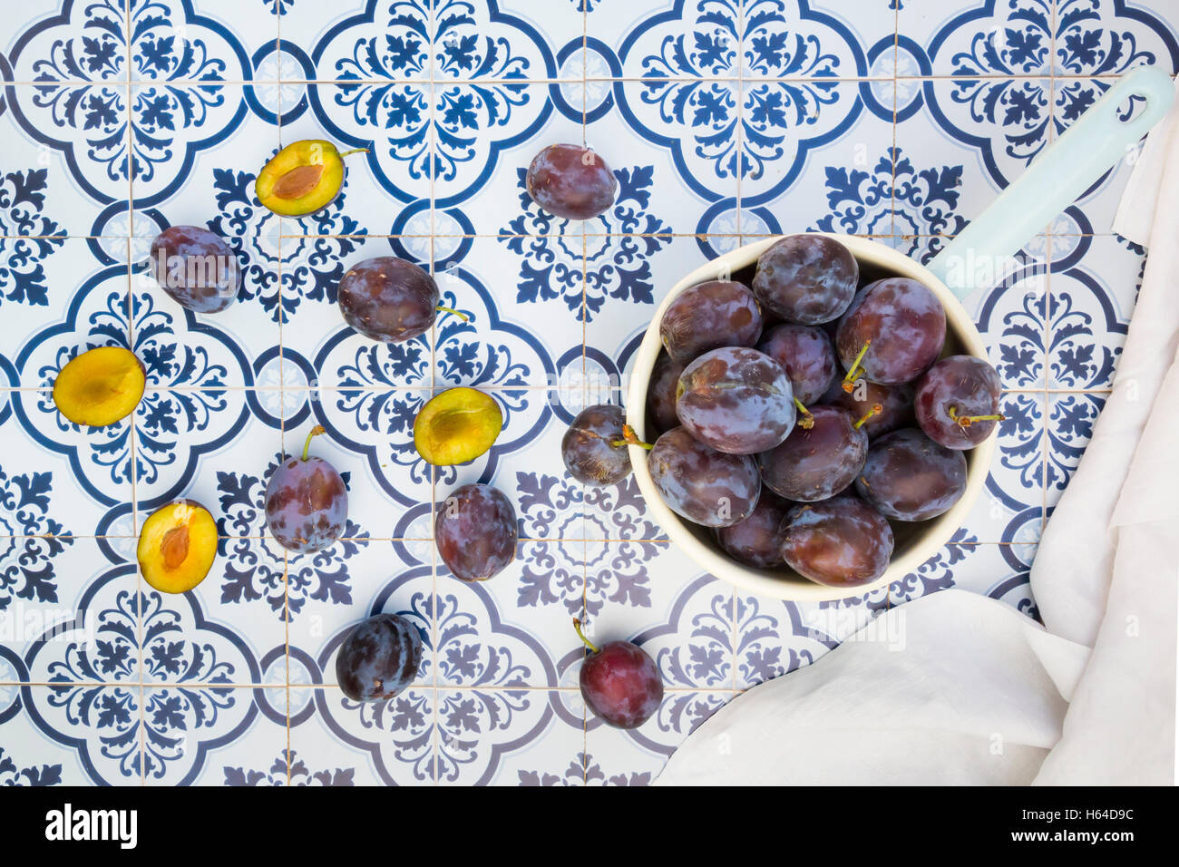 Saucepan of plums Stock Photo