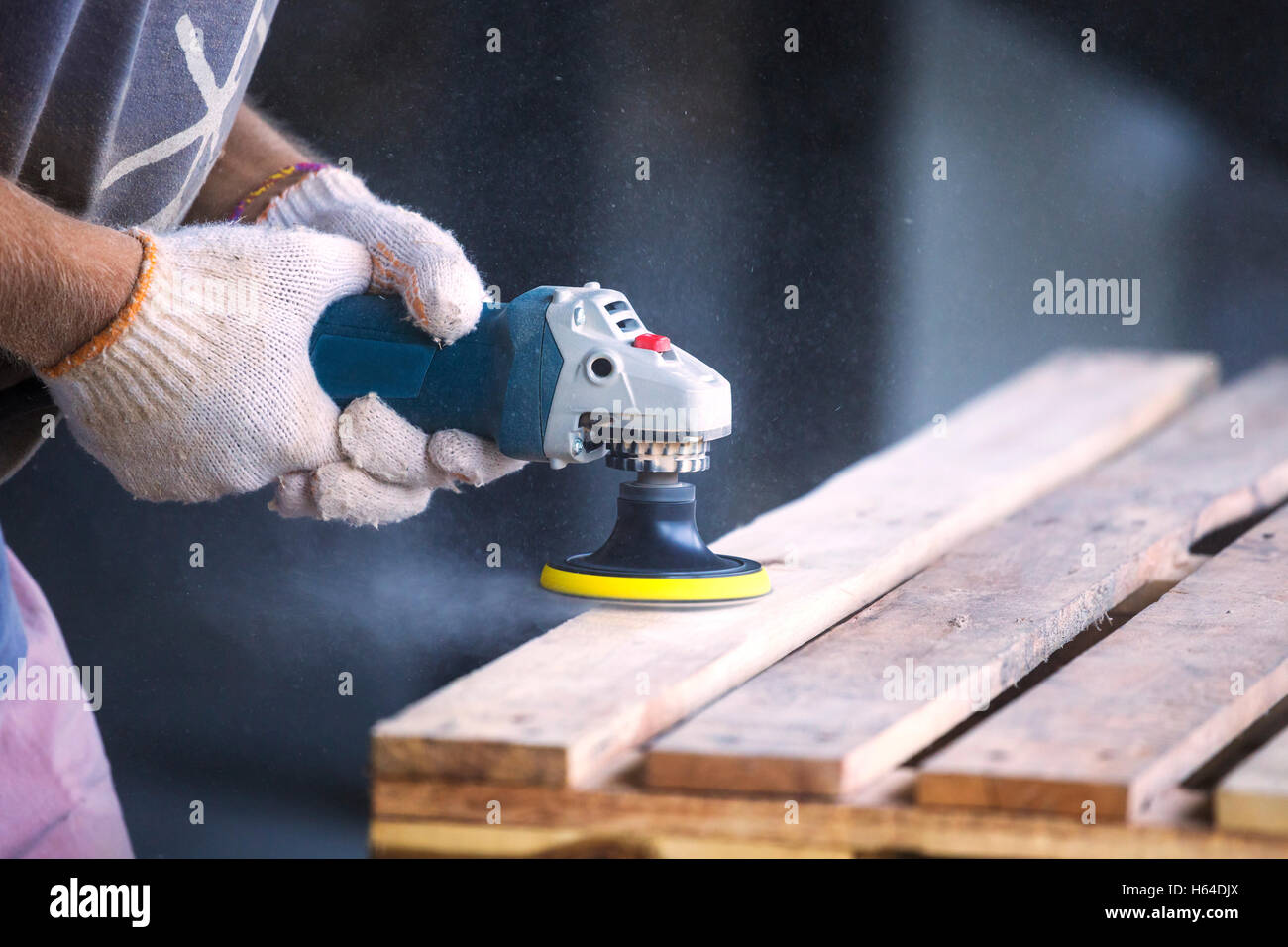 Man sanding wood with a random orbital sander Stock Photo Alamy