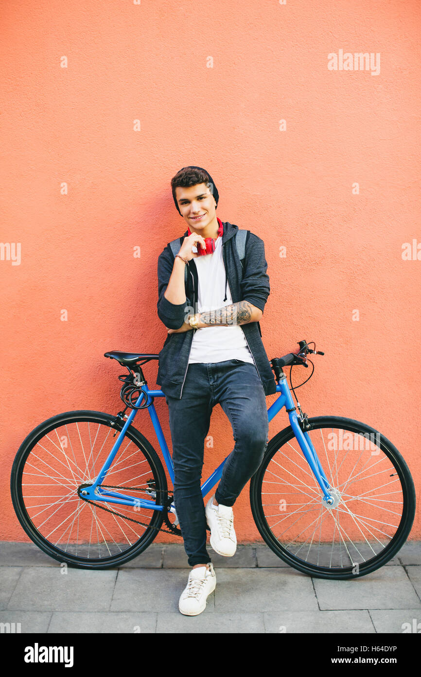 Teenager with a fixie bike, smiling Stock Photo