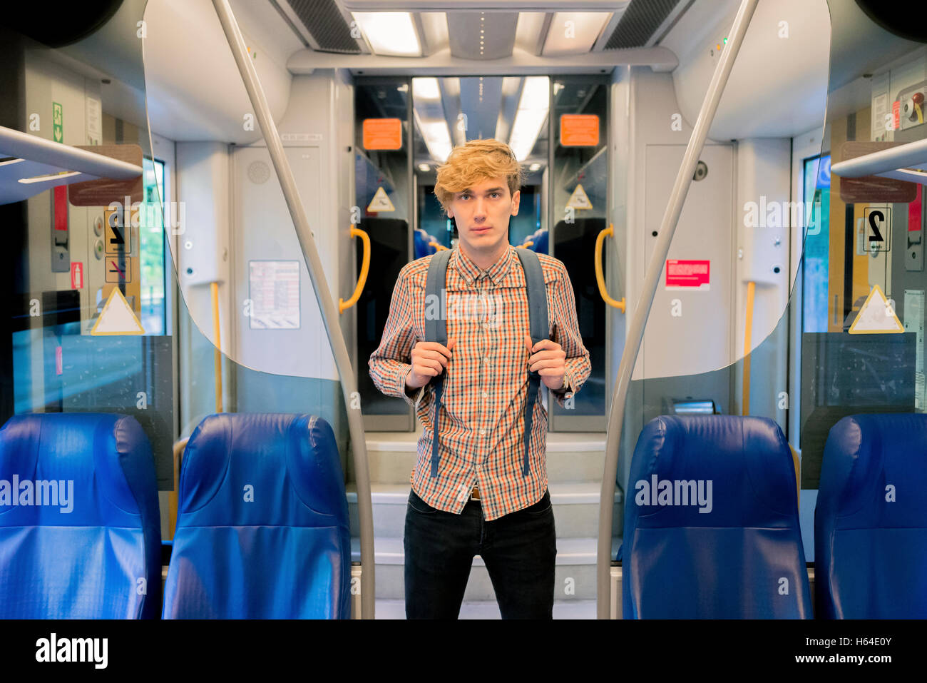 Backpack on a train hi-res stock photography and images - Alamy