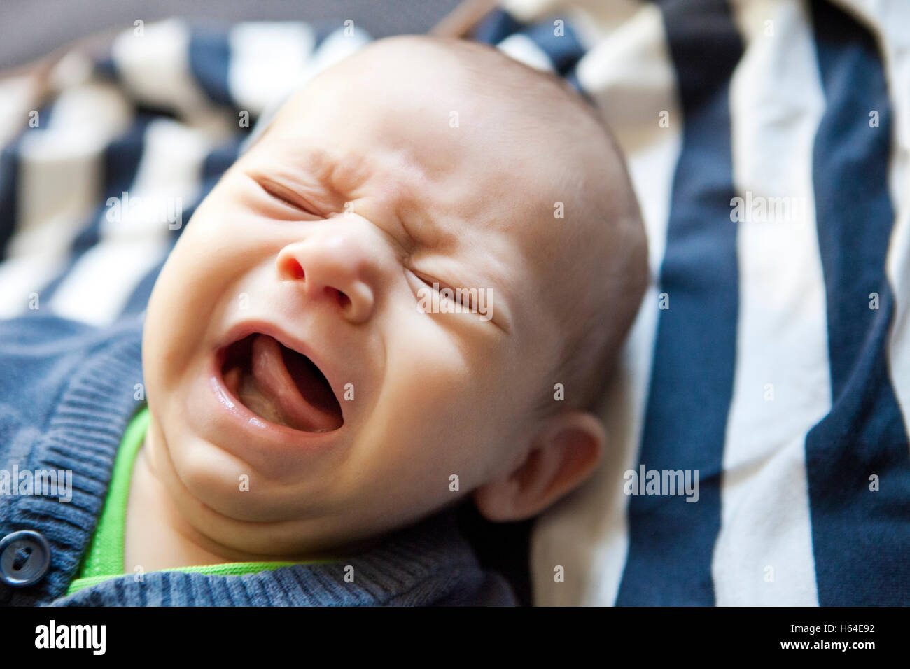 Crying baby face hi-res stock photography and images - Alamy