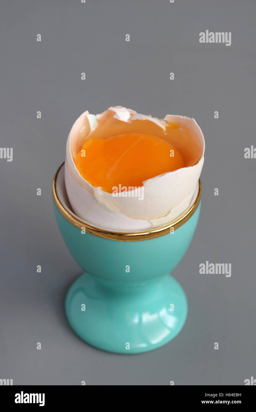 Raw egg in an eggcup Stock Photo