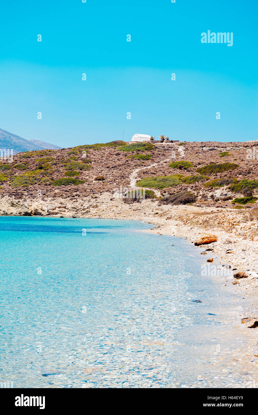 Greece, Cyclades, Amorgos, eooden dock and Aegean Sea in Nikouria island Stock Photo