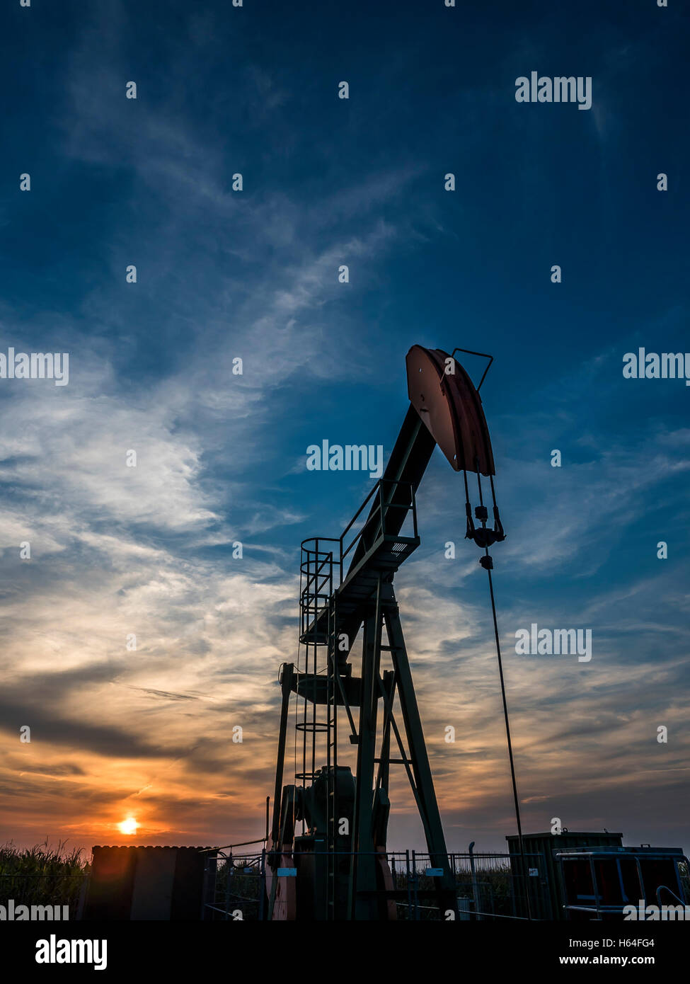 Austria, Voitsdorf, production well, petroleum production at sunset Stock Photo
