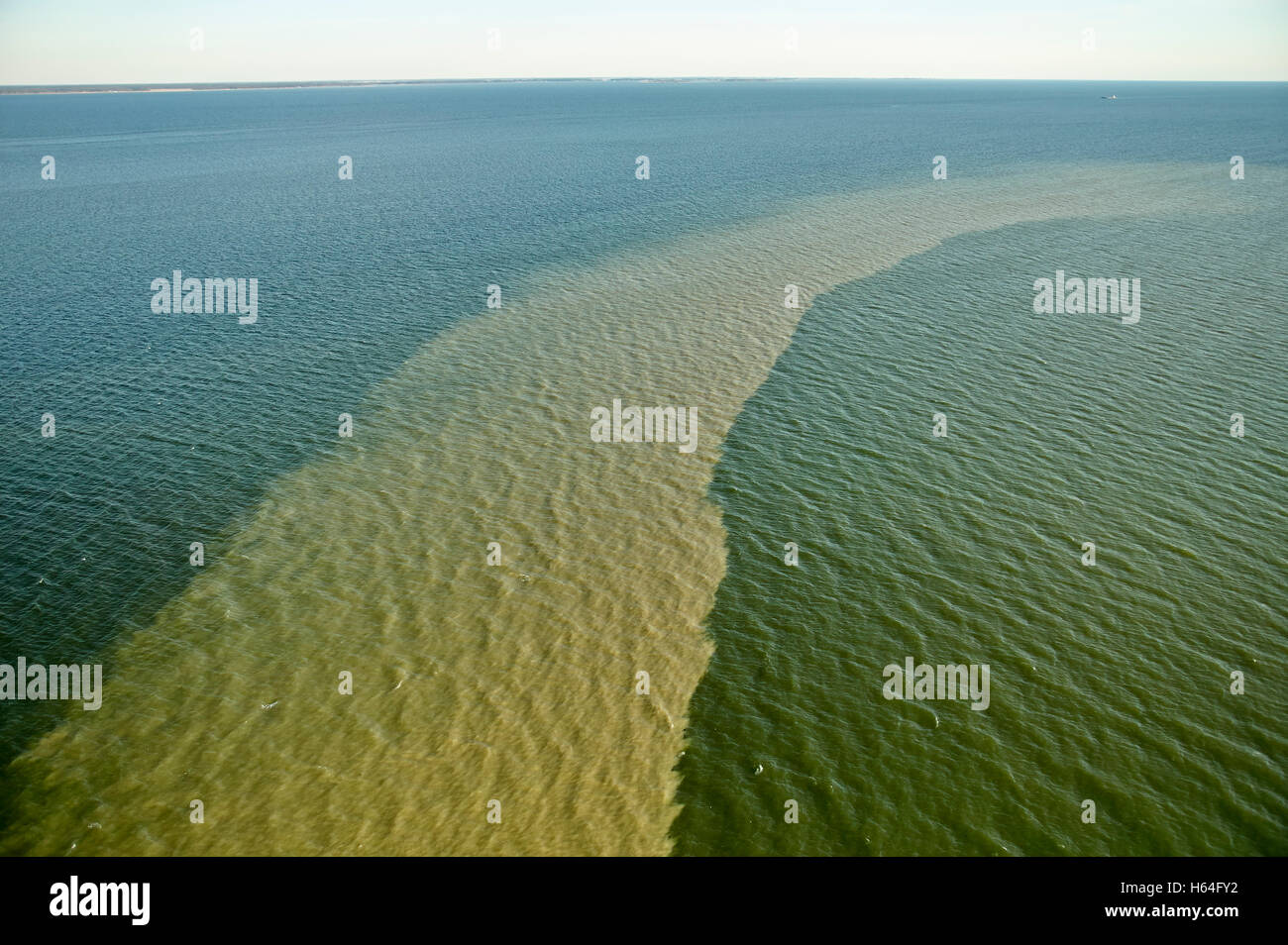 USA, Maryland, Aerial photograph of discoloration in the Chesapeake Bay after a container ship has passed through Stock Photo