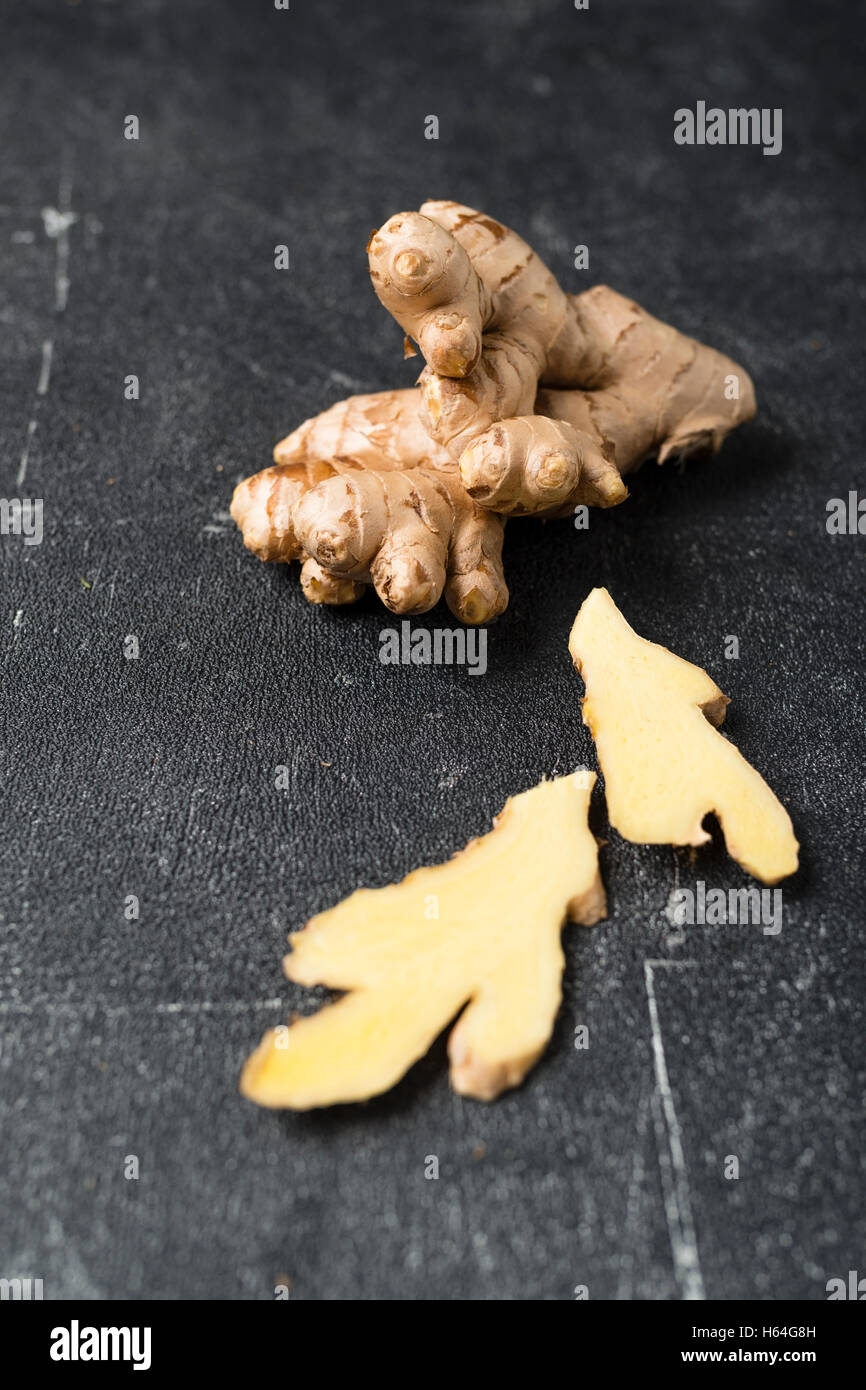 Ginger root, halved and whole Stock Photo Alamy