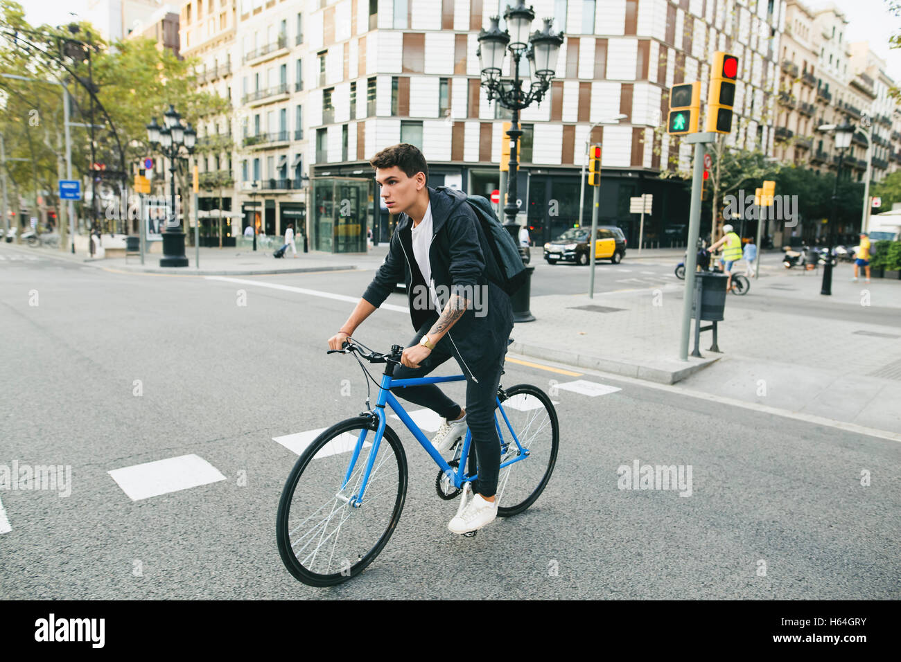Teenager with a fixie bike in the city Stock Photo