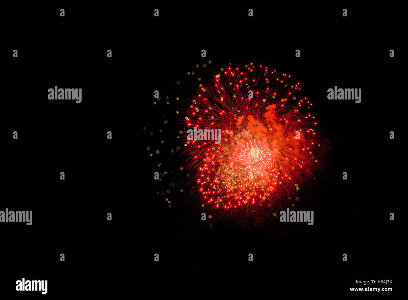 Holiday fireworks of colored lights isolated on the black background of the night sky. Stock Photo