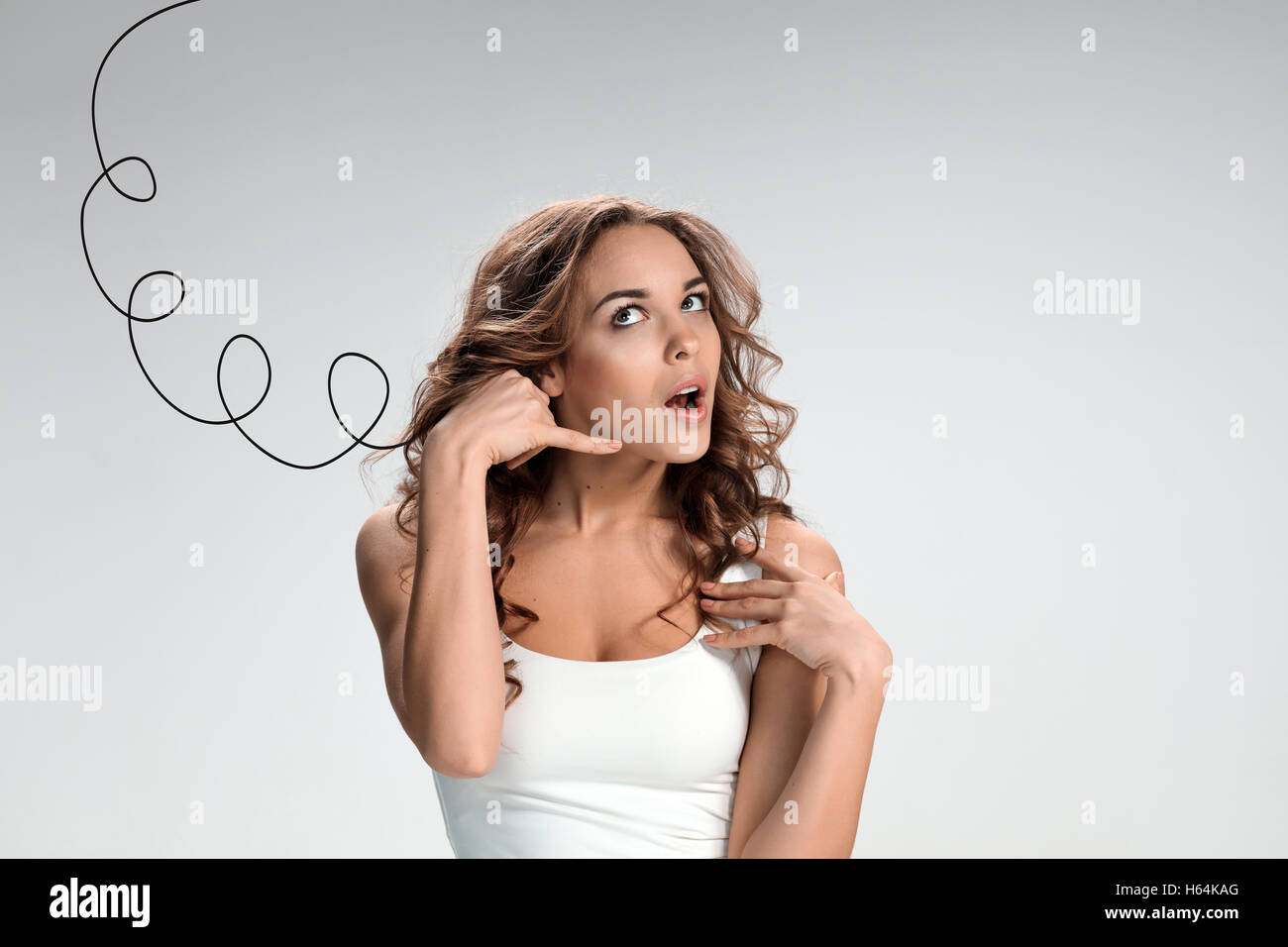 The young woman waiting for a response Stock Photo