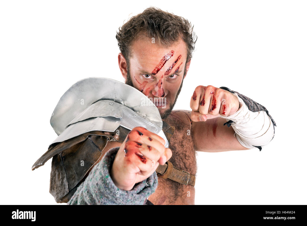 Ancient warrior or Gladiator isolated in a white background Stock Photo