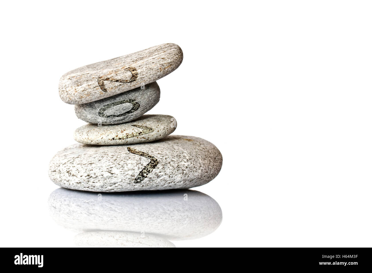 2017 written on stack of pebbles isolated on white background Stock Photo