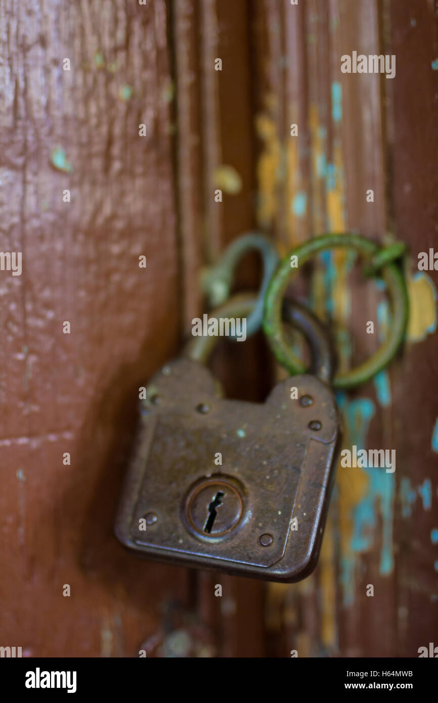 Old rusty lock on the wooden gate Stock Photo - Alamy